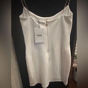 Nookie white cocktail dress w liner & gold chains. Sizes Medium, Large and XL
